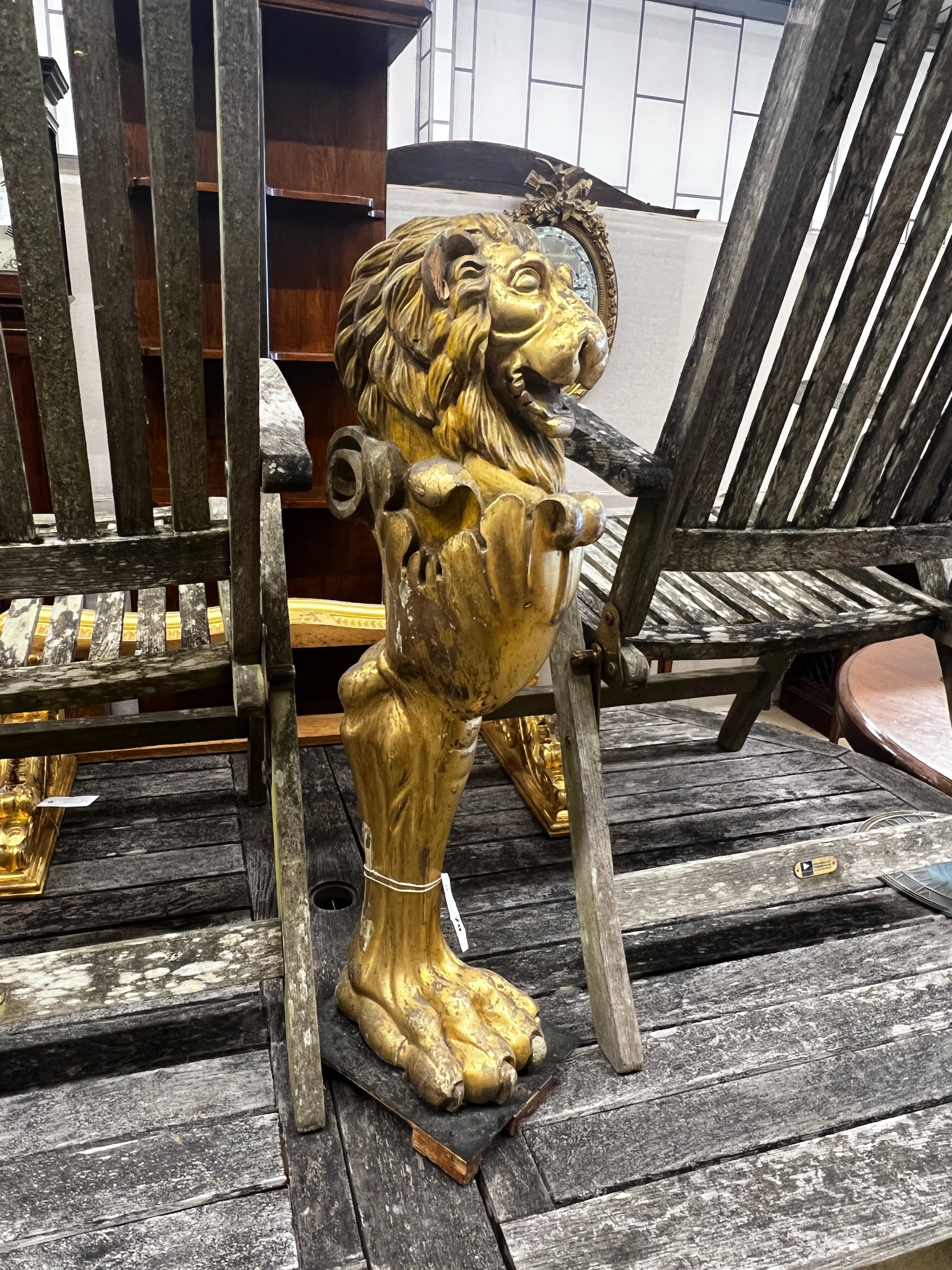 A Regency carved giltwood Monopodia console column, height 78cm